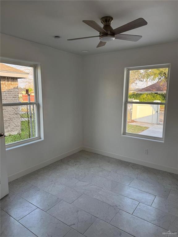 4912 South 36th Street McAllen, TX 78503 - Photo 8 of 15 a view of an empty room with a window