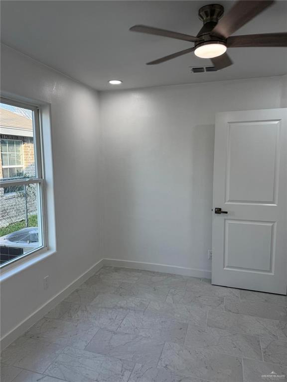 4912 South 36th Street McAllen, TX 78503 - Photo 9 of 15 an empty room with a window