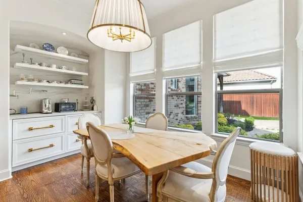 a view of a dining room with furniture window and outside view