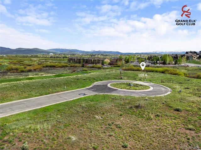 a view of a swimming pool with an outdoor seating