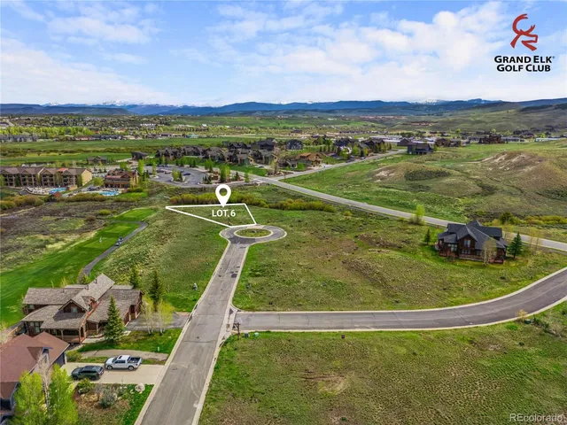 a view of a swimming pool with a lake view
