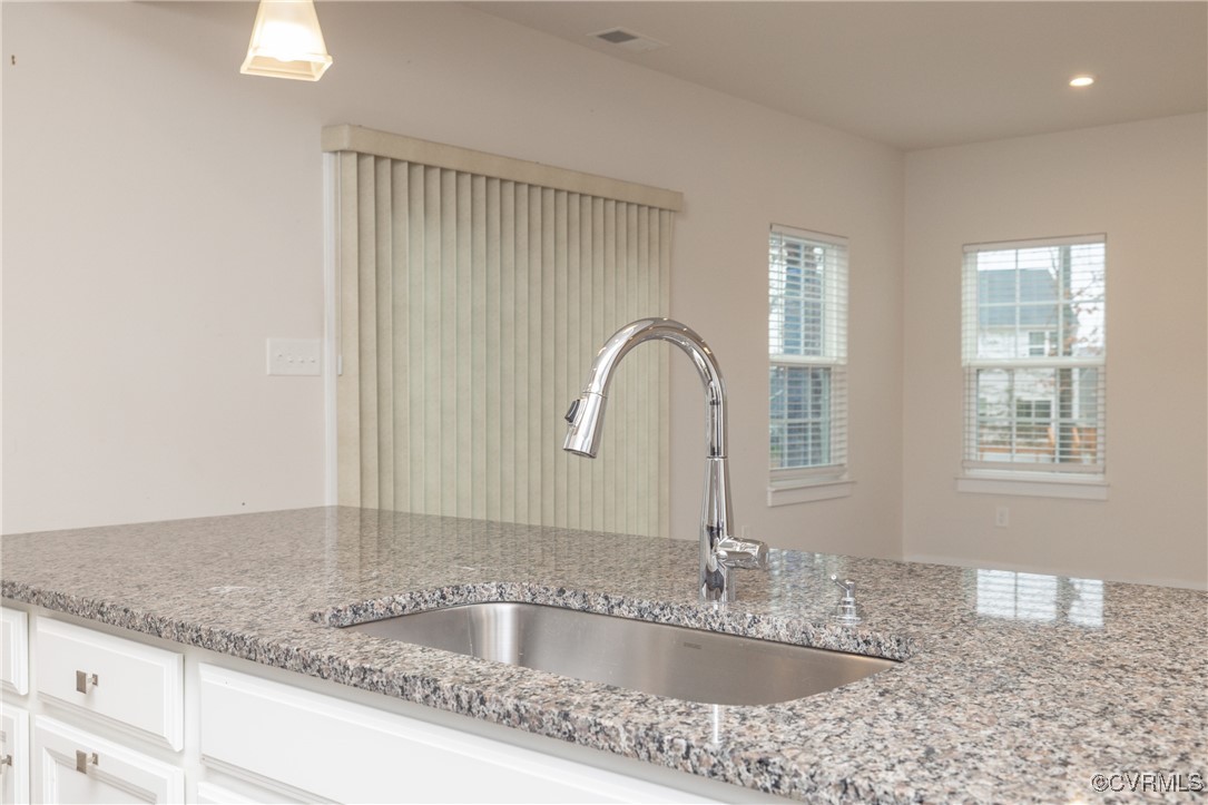 13900 Marsham Road Chester, VA 23836 - Photo 13 of 46 a close view of sink and mirror
