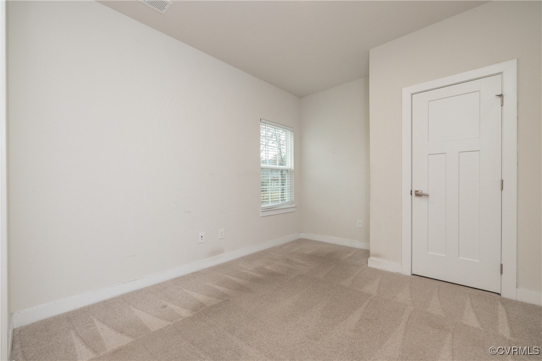 13900 Marsham Road Chester, VA 23836 - Photo 15 of 46 an empty room with windows