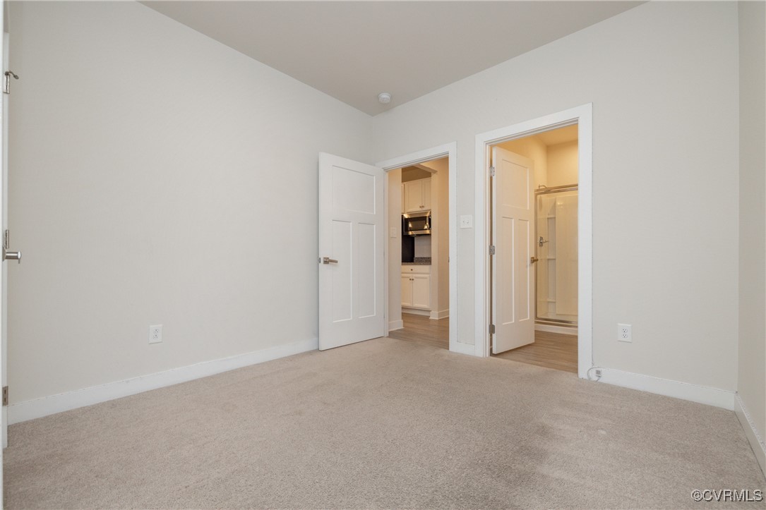 13900 Marsham Road Chester, VA 23836 - Photo 16 of 46 a view of an empty room and closet area