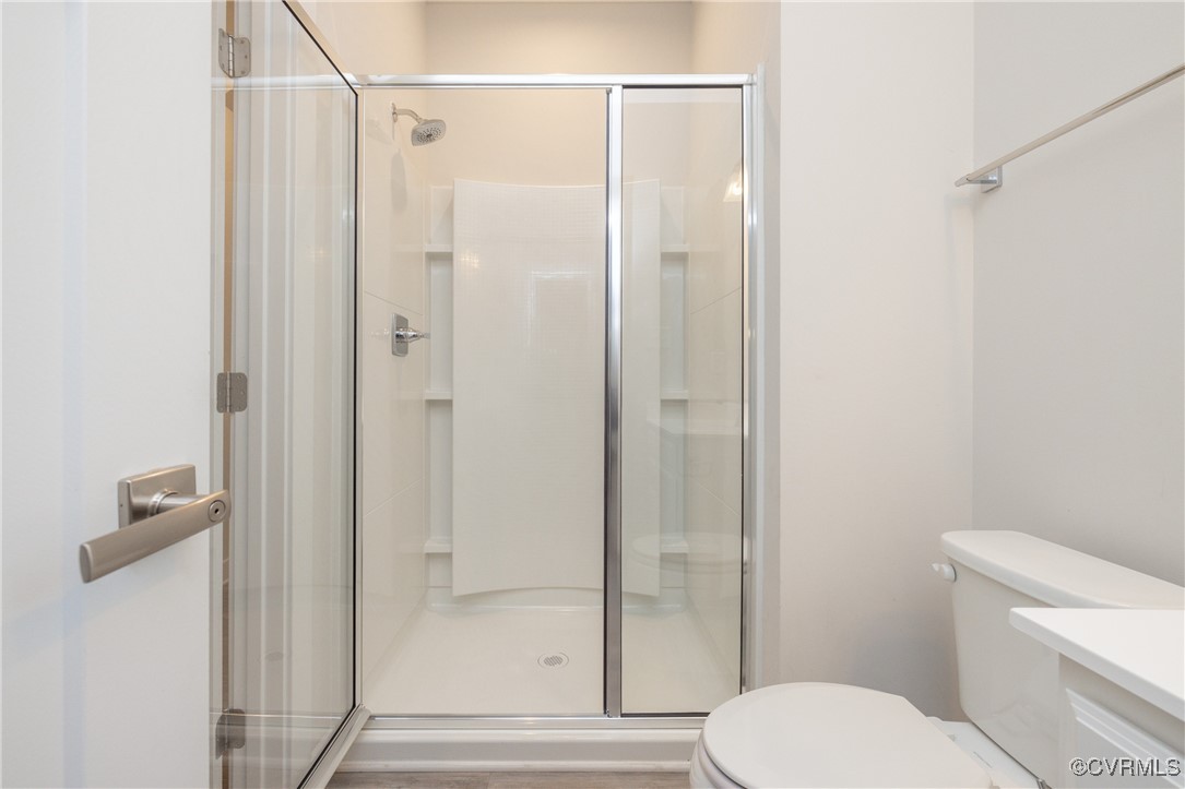 13900 Marsham Road Chester, VA 23836 - Photo 19 of 46 a bathroom with a toilet and a shower