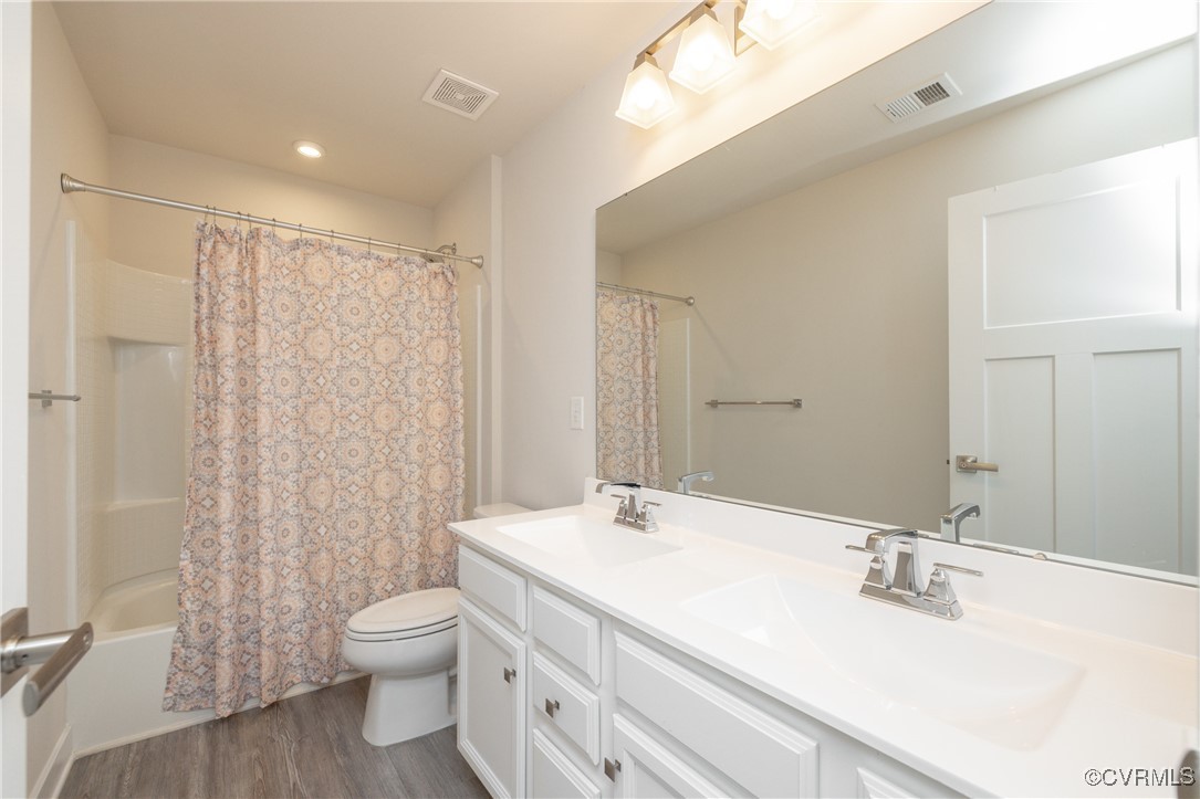13900 Marsham Road Chester, VA 23836 - Photo 30 of 46 a bathroom with a sink and a mirror