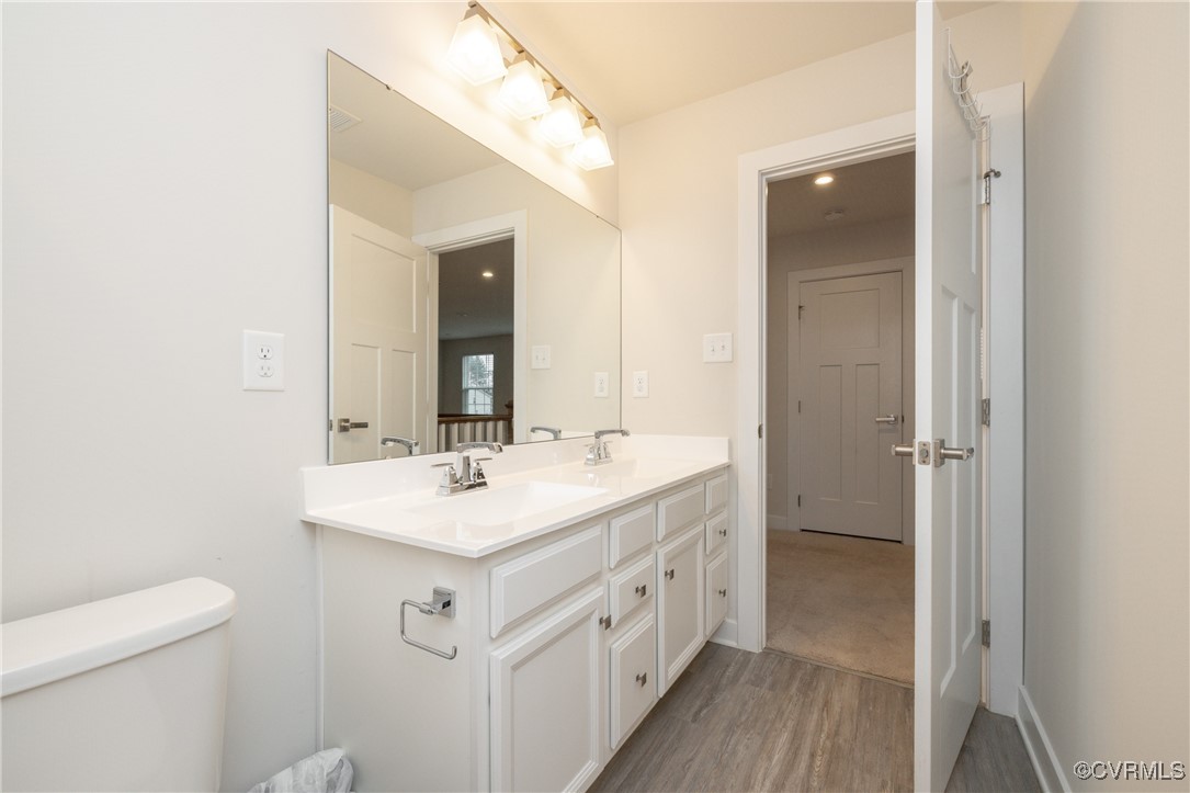 13900 Marsham Road Chester, VA 23836 - Photo 31 of 46 a bathroom with a sink and a mirror