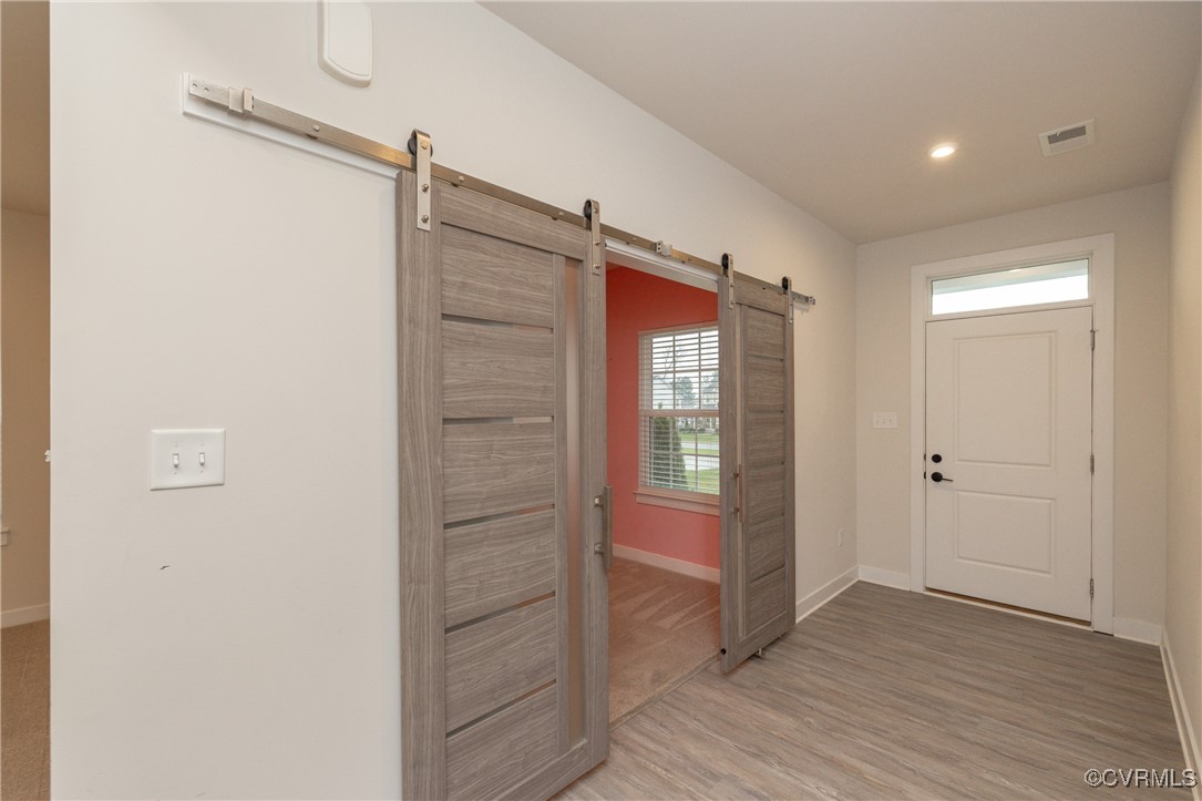 13900 Marsham Road Chester, VA 23836 - Photo 4 of 46 a view of entryway with wooden floor