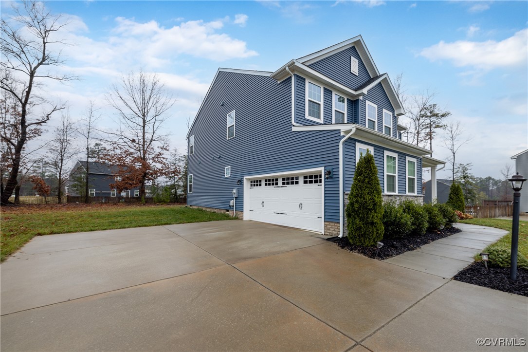 13900 Marsham Road Chester, VA 23836 - Photo 41 of 46 a front view of a house with garden