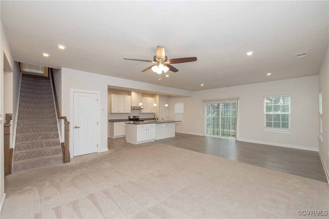 13900 Marsham Road Chester, VA 23836 - Photo 6 of 46 a view of an empty room with a window and kitchen view