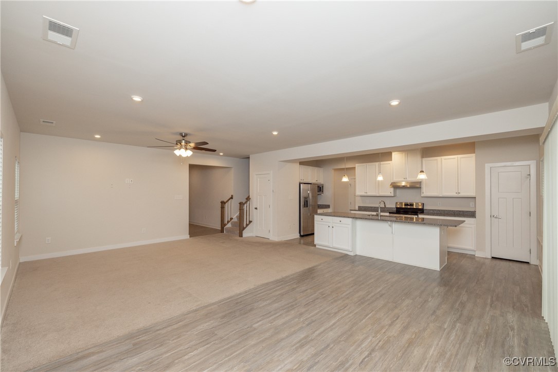 13900 Marsham Road Chester, VA 23836 - Photo 7 of 46 a large kitchen with a lot of counter space and a sink