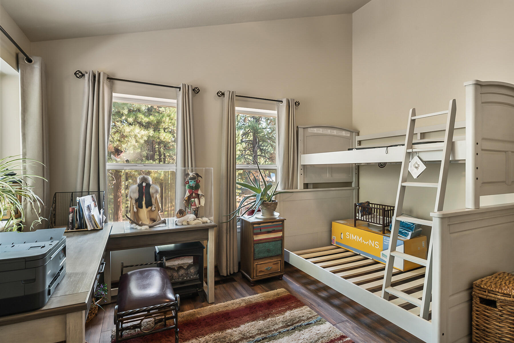 15730 Jackpine Road La Pine, OR 97739 - Photo 21 of 43 a bedroom with furniture and a window