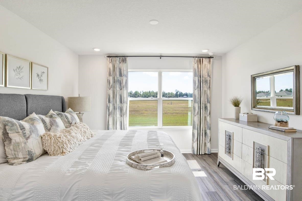 21965 Aleutian Avenue Foley, AL 36535 - Photo 15 of 74 Bedroom featuring hardwood / wood-style flooring