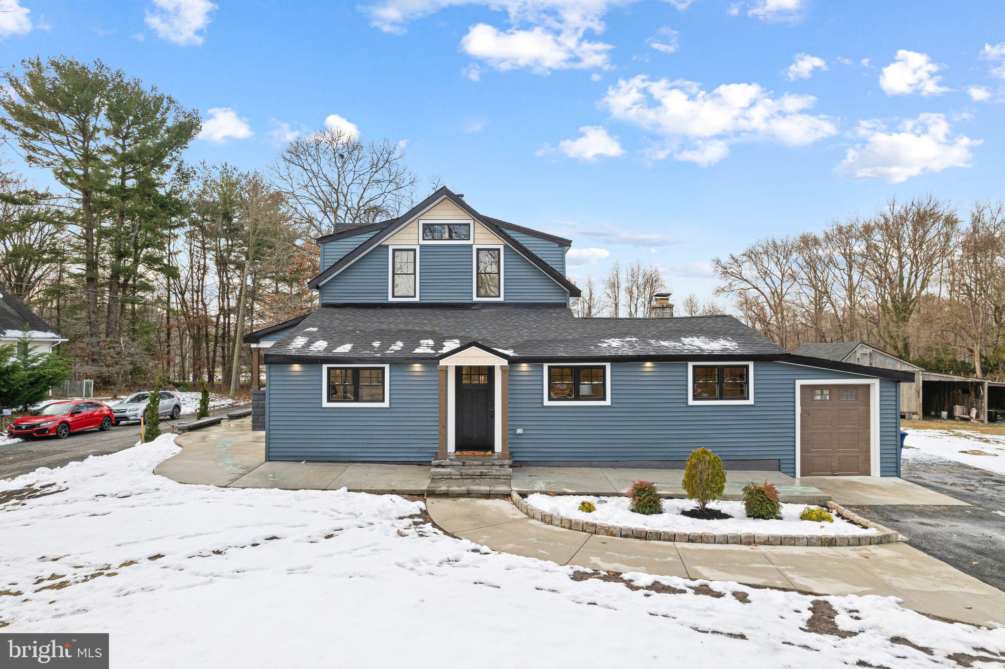 595 Church Road Sewell, NJ 08080 - Photo 2 of 32 a front view of a house with a yard