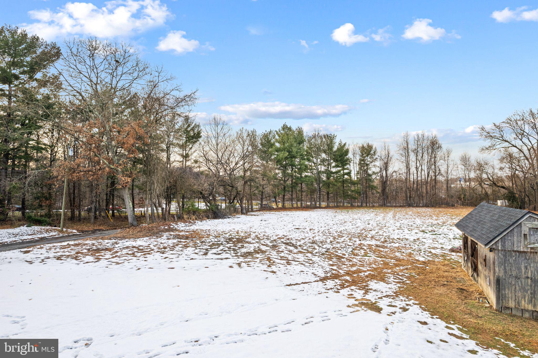 595 Church Road Sewell, NJ 08080 - Photo 31 of 32 a view of a yard with a tree