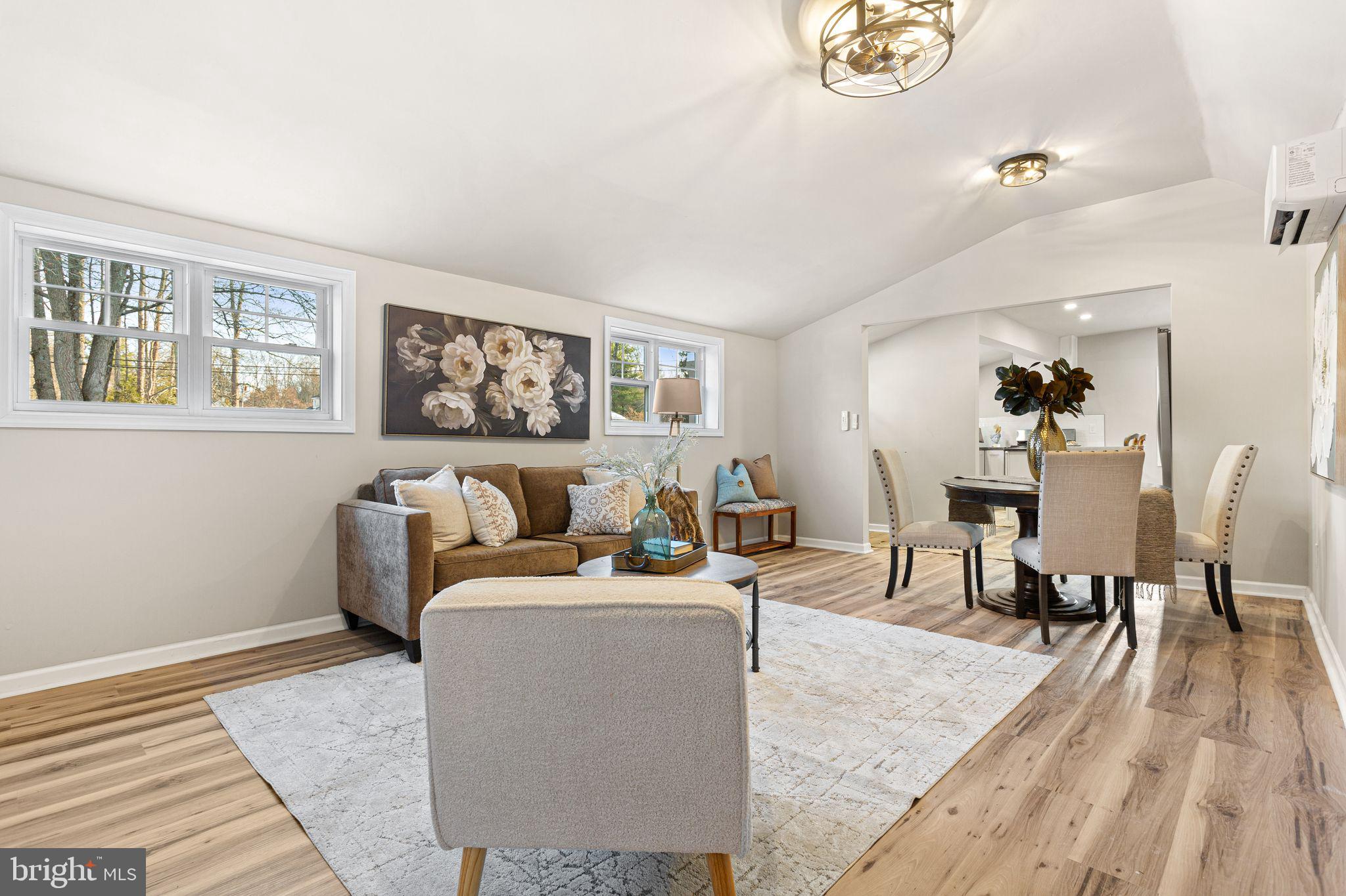 595 Church Road Sewell, NJ 08080 - Photo 7 of 32 a living room with furniture and a table