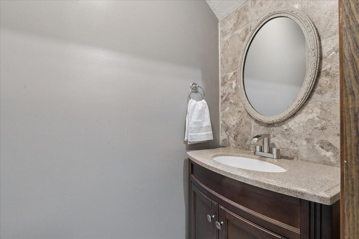431 Langdon Road Evington, VA 24550 - Photo 20 of 54 a bathroom with a granite countertop sink and a mirror