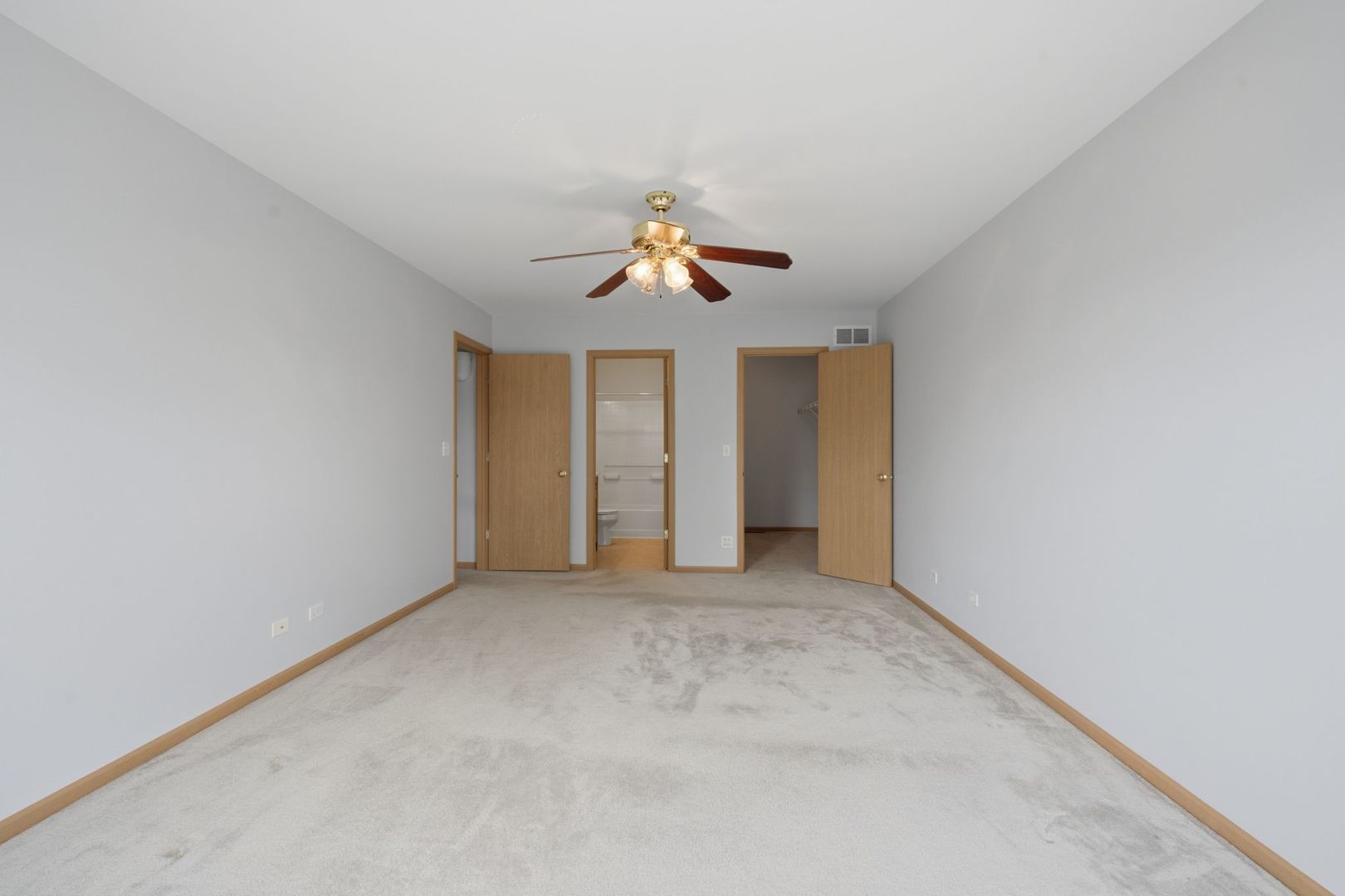 1758 Edith Lane Aurora, IL 60504 - Photo 16 of 28 a view of a room with a ceiling fan and window