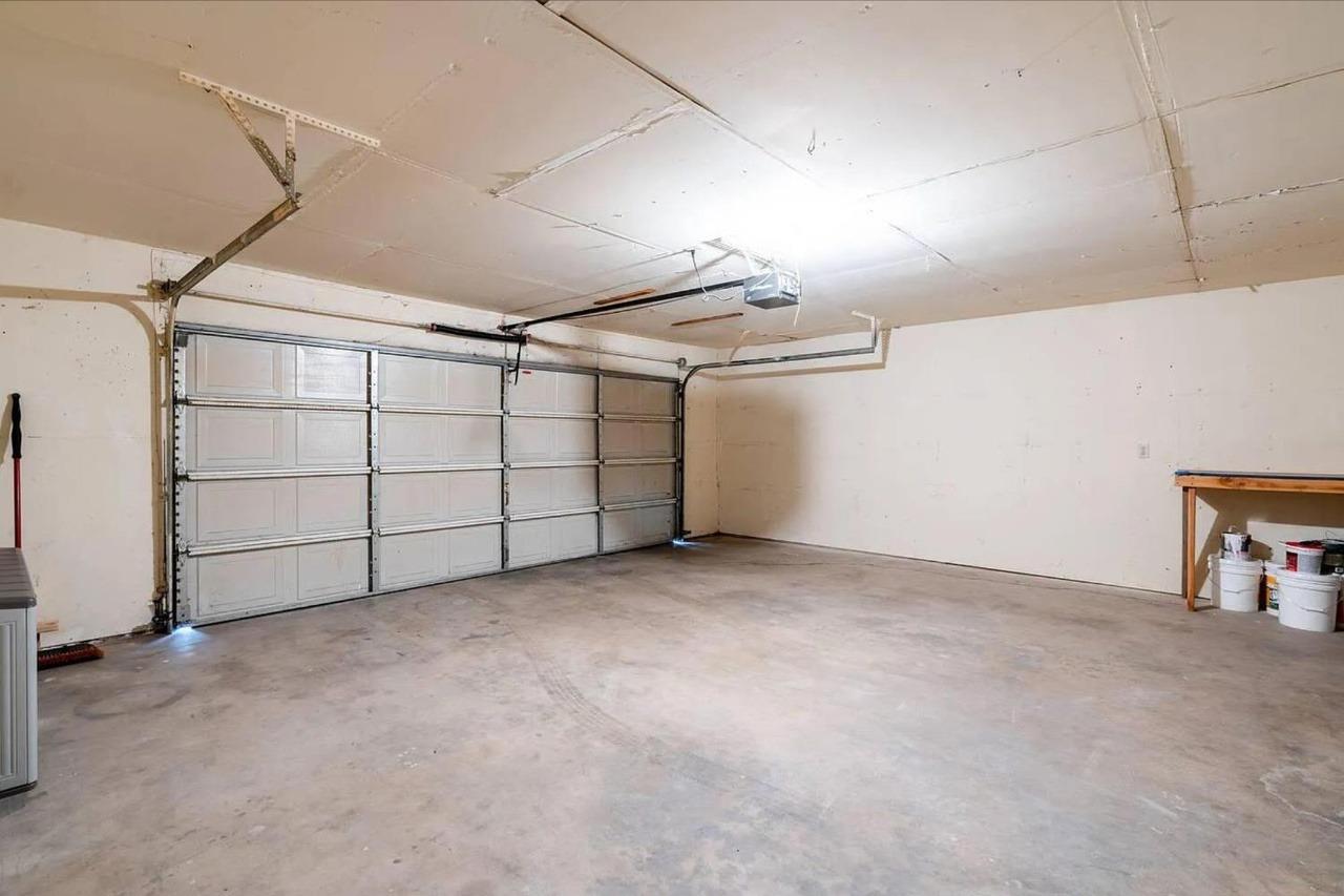 1504 Pierce Drive, Unit 102 Clovis, CA 93612 - Photo 17 of 20 a view of a garage