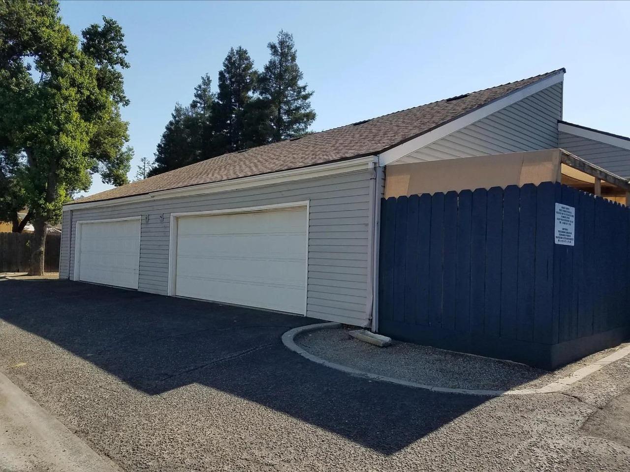 1504 Pierce Drive, Unit 102 Clovis, CA 93612 - Photo 19 of 20 a view of backyard with garage
