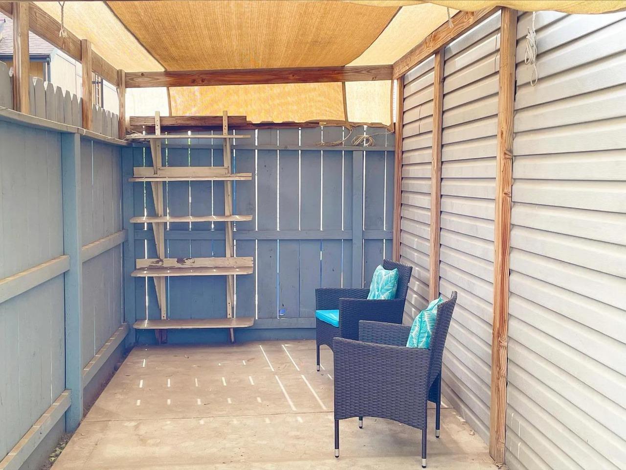 1504 Pierce Drive, Unit 102 Clovis, CA 93612 - Photo 10 of 20 a balcony with furniture and a potted plant