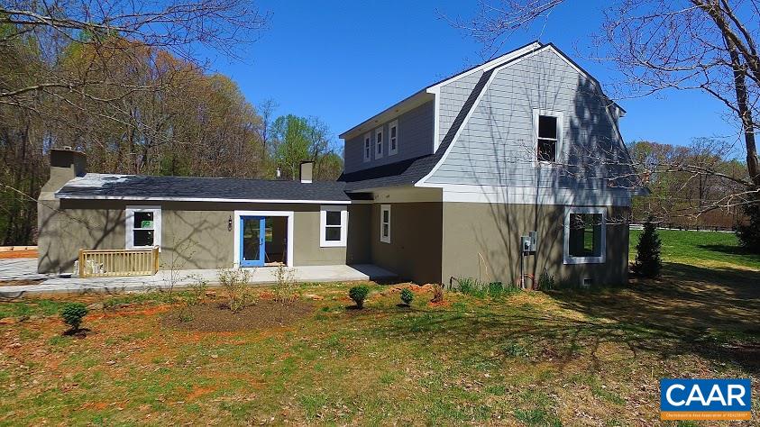 268 Dry Bridge Road Charlottesville, VA 22903 - Photo 12 of 36 a front view of a house with garden