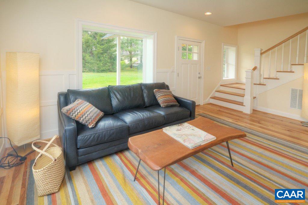 268 Dry Bridge Road Charlottesville, VA 22903 - Photo 16 of 36 a living room with furniture and a window