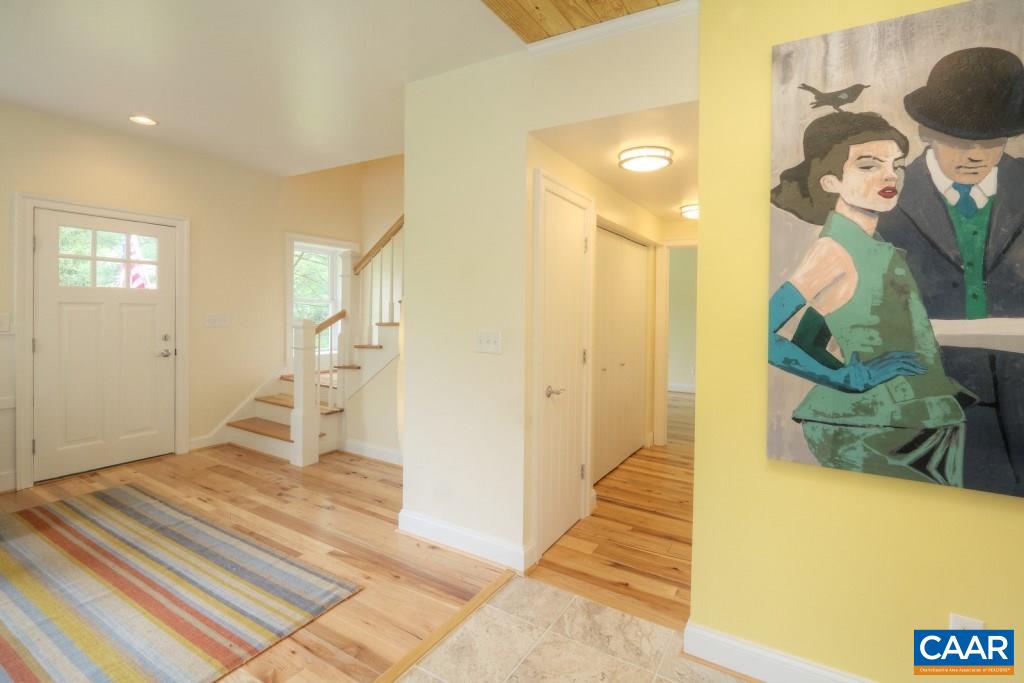268 Dry Bridge Road Charlottesville, VA 22903 - Photo 17 of 36 a bedroom with a bed and cabinets