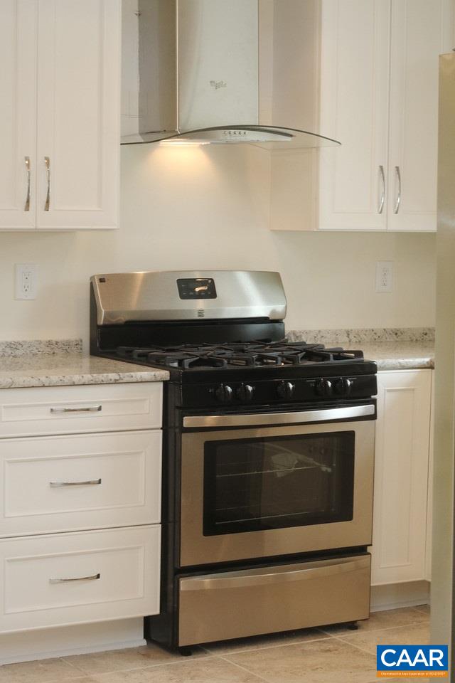 268 Dry Bridge Road Charlottesville, VA 22903 - Photo 19 of 36 a stove top oven sitting inside of a kitchen