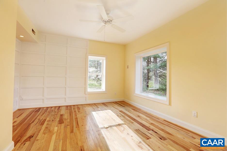 268 Dry Bridge Road Charlottesville, VA 22903 - Photo 31 of 36 a view of a room with wooden floor and fan
