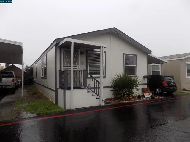 a house view with a garden space