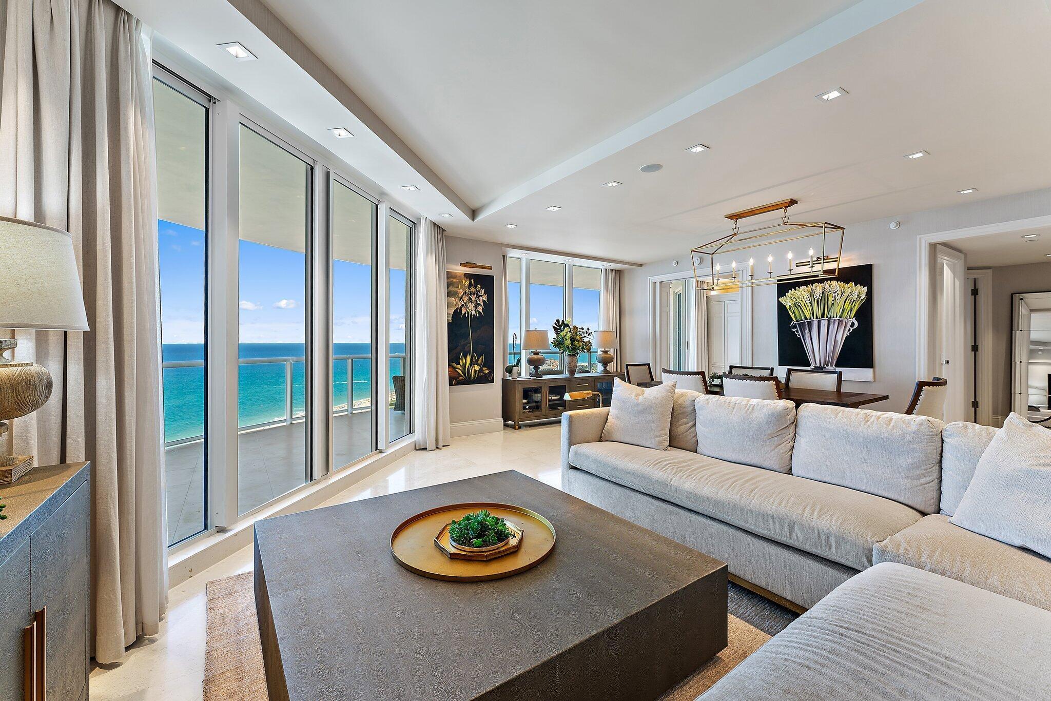 2700 North Ocean Drive, Unit 2304B Singer Island, FL 33404 - Photo 12 of 73 a living room with furniture and a wooden floor
