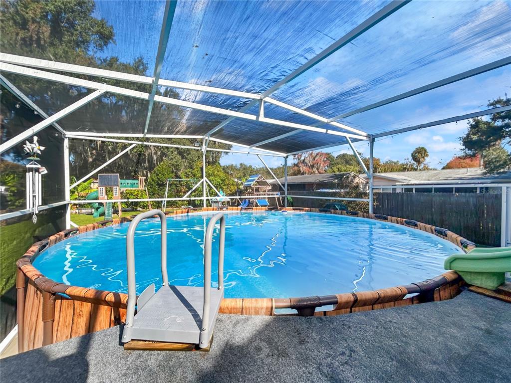 608 West Nelson Street Tavares, FL 32778 - Photo 16 of 17 a view of outdoor space with seating area