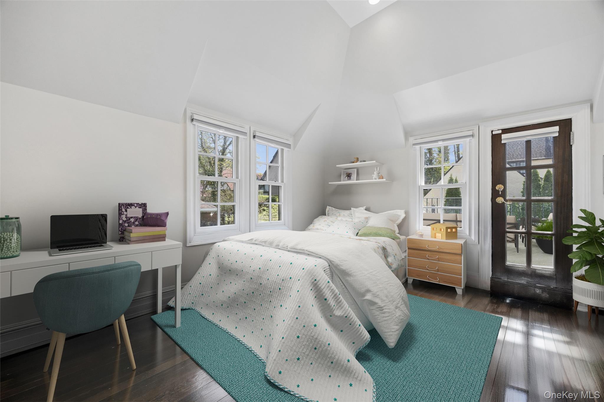 216 Beverly Road Queens, NY 11363 - Photo 10 of 50 a bedroom with a bed and large window