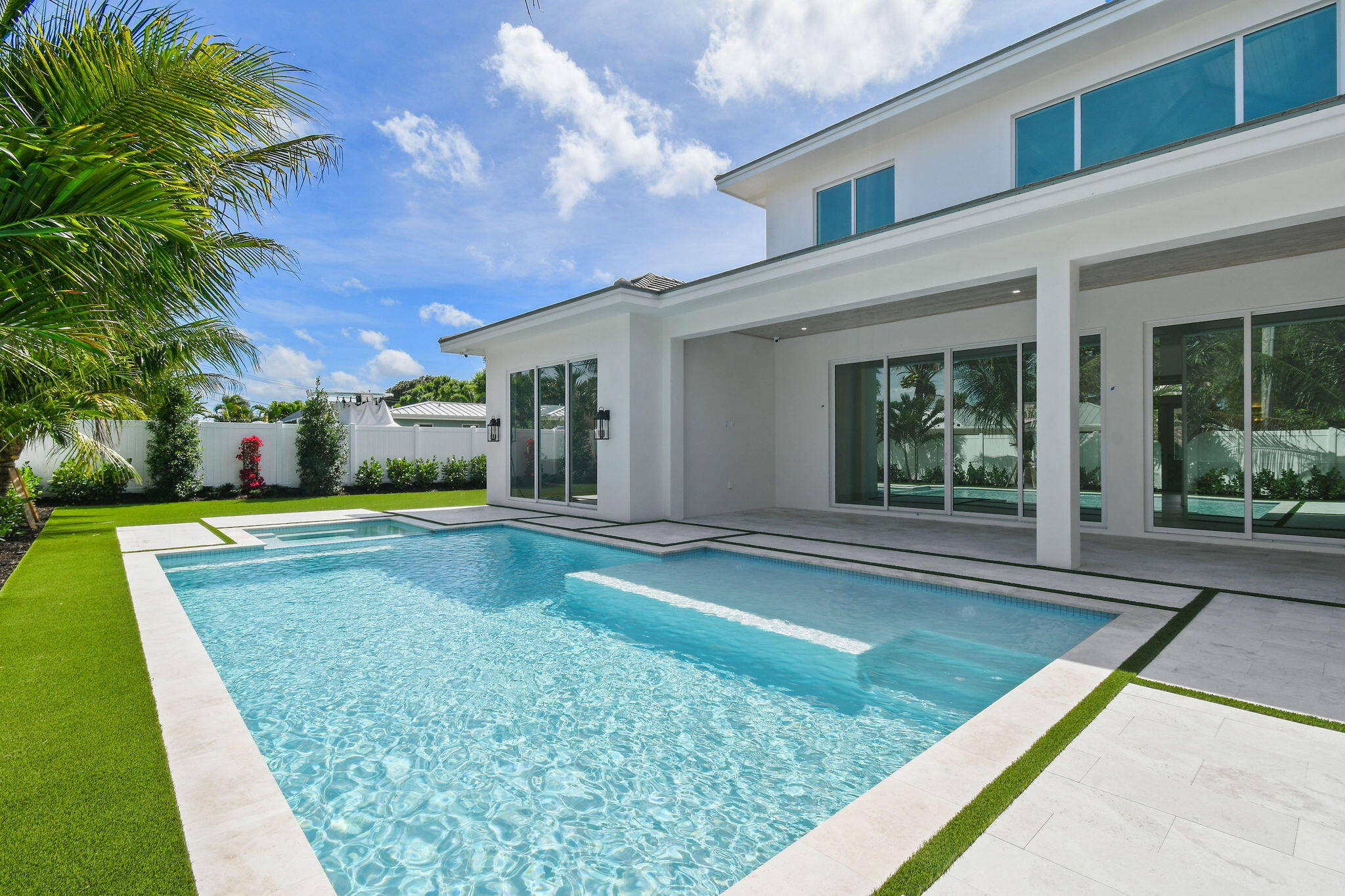 192 River Drive Jupiter, FL 33469 - Photo 32 of 45 a view of a patio with a table and chairs