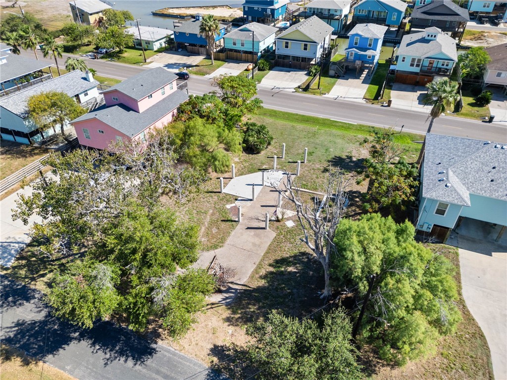 4014 Laguna Shores Road Corpus Christi, TX 78418 - Photo 5 of 6 an aerial view of multiple houses with yard
