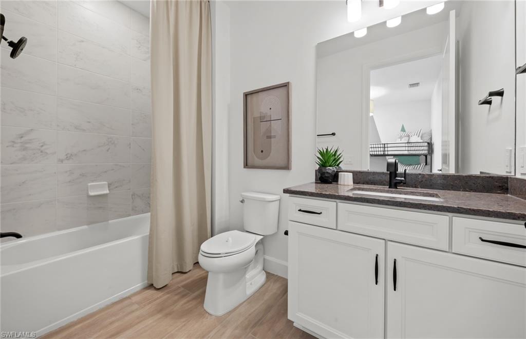 2072 Freemont Way Naples, FL 34120 - Photo 16 of 18 Photos are from a furnished model. Options for this home may vary.