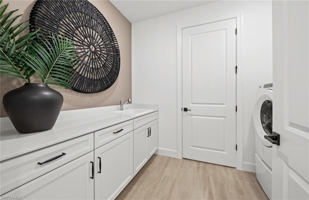 2072 Freemont Way Naples, FL 34120 - Photo 17 of 18 Photos are from a furnished model. Options for this home may vary.