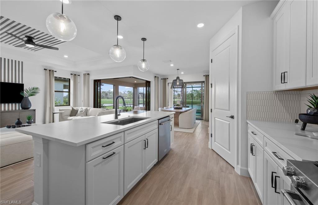 2072 Freemont Way Naples, FL 34120 - Photo 7 of 18 Photos are from a furnished model. Options for this home may vary.