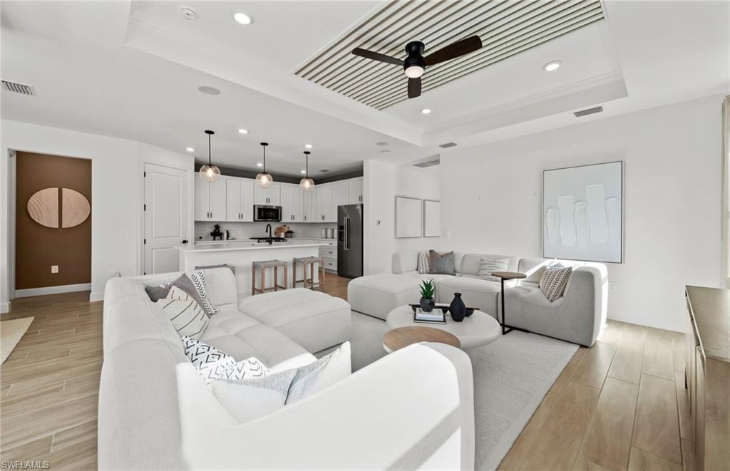 2072 Freemont Way Naples, FL 34120 - Photo 8 of 18 Photos are from a furnished model. Options for this home may vary.