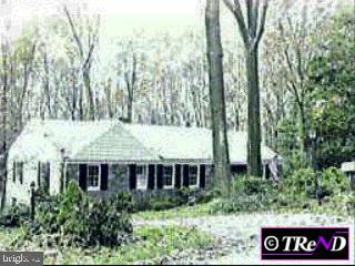 654 Knox Road Wayne, PA 19087 - Photo 1 of 1 a view of a house with a yard and potted plants