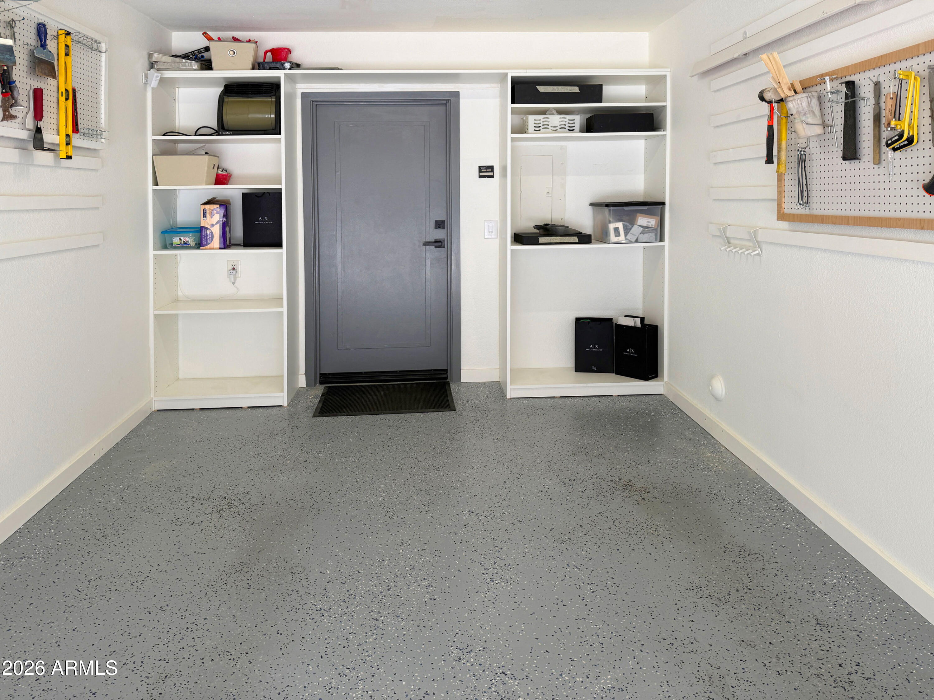 3633 North 3rd Avenue, Unit 1027 Phoenix, AZ 85013 - Photo 15 of 29 a room with a refrigerator and cabinets