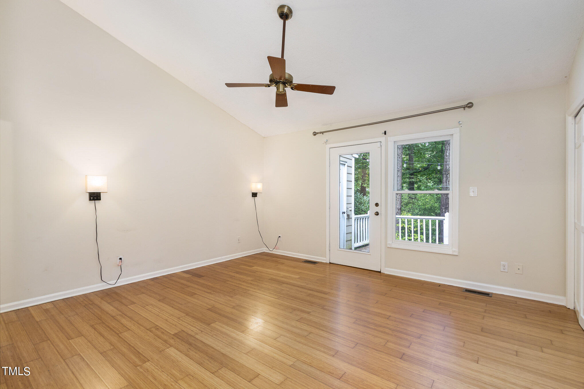 7831 Breckon Way Raleigh, NC 27615 - Photo 16 of 29 a view of an empty room with a window