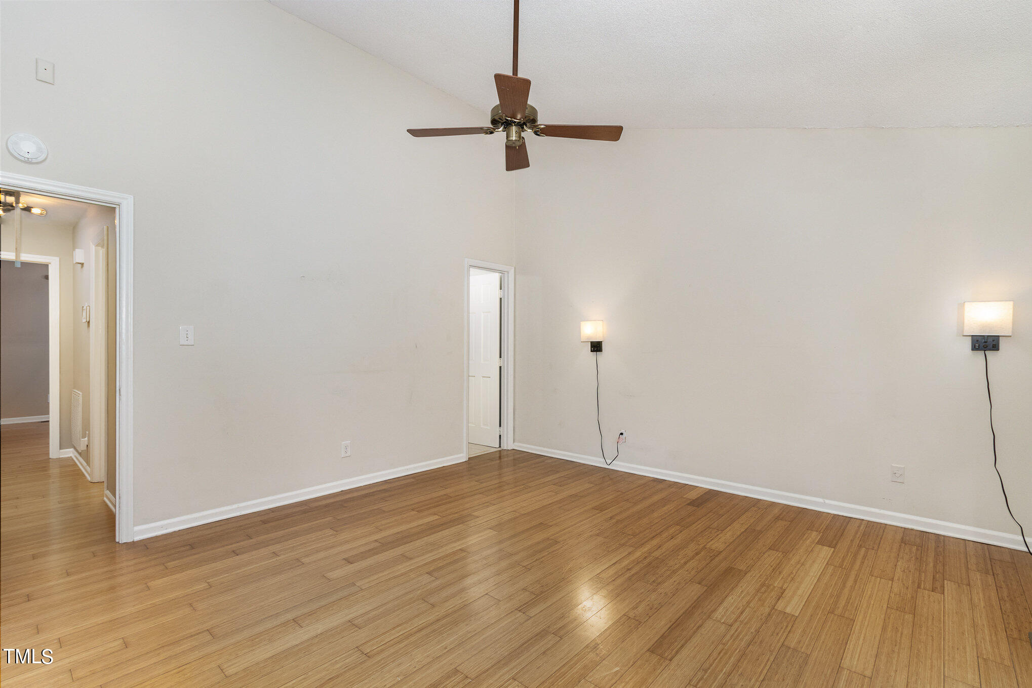 7831 Breckon Way Raleigh, NC 27615 - Photo 17 of 29 a view of a room with wooden floor