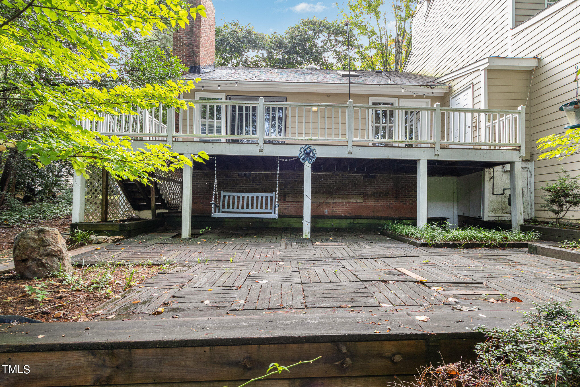 7831 Breckon Way Raleigh, NC 27615 - Photo 29 of 29 a front view of a house with a yard and potted plants