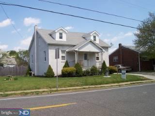 417 Democrat Road Gibbstown, NJ 08027 - Photo 3 of 3 a front view of a house with a yard