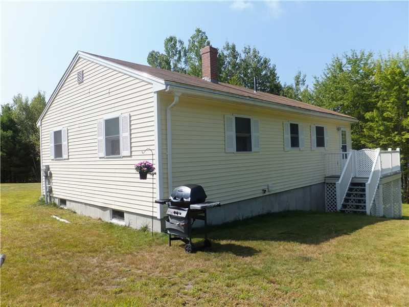 439 Convene Road Sebago, ME 04029 - Photo 5 of 33 Exterior Side View. Composite Deck...