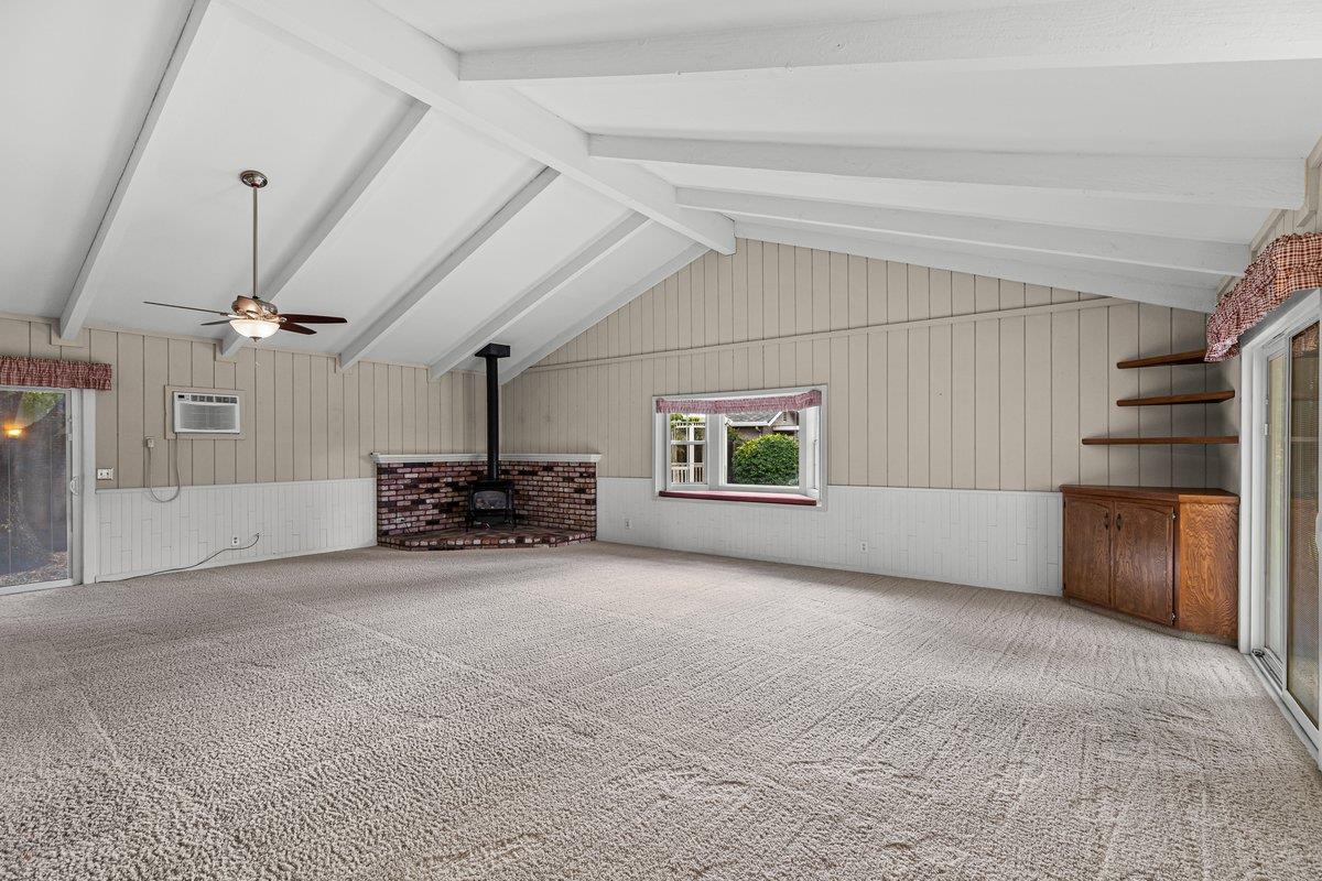244 California Street Ripon, CA 95366 - Photo 17 of 34 a view of a livingroom with a ceiling fan and window