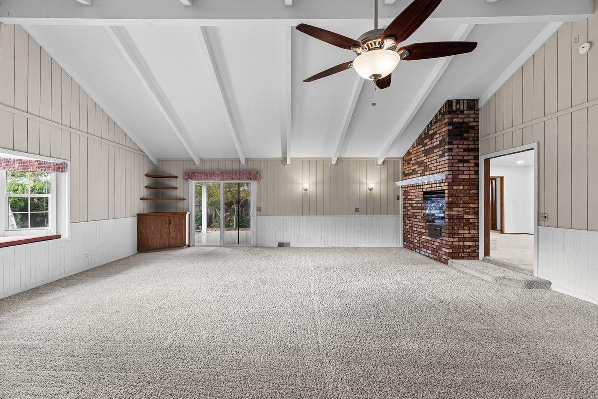 244 California Street Ripon, CA 95366 - Photo 19 of 34 a view of a livingroom with furniture and a ceiling fan