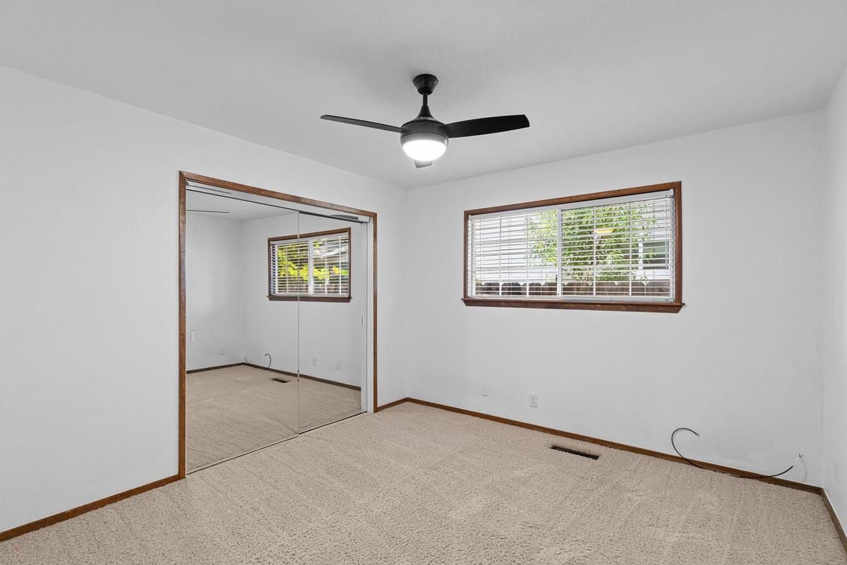 244 California Street Ripon, CA 95366 - Photo 25 of 34 a view of an empty room with a window